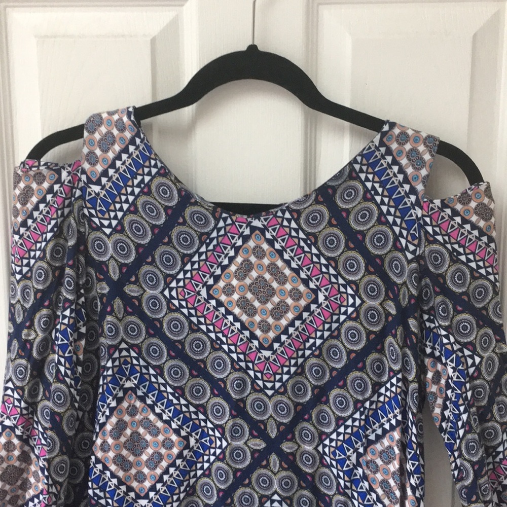 Cut out shoulder blouse.